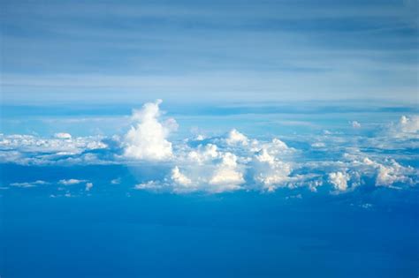 Premium Photo Clouds A View From Airplane Window Sky Background