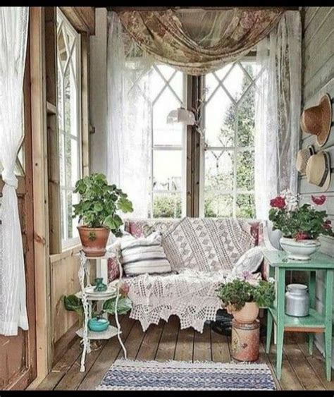 A Living Room Filled With Furniture And Lots Of Plants