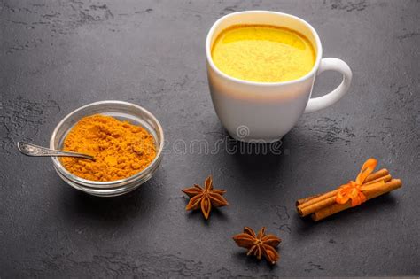 Glass Cup Of Traditional Indian Masala Chai Tea With Ingredients Above