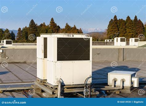 A Row Of Air Conditioning Units On A Rooftop Stock Photo Image Of