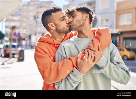 Two Man Couple Hugging Each Other And Kissing At Street Stock Photo Alamy