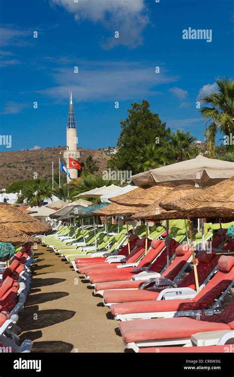 Sunloungers And Parasols On The Beach Of Bitez Near Bodrum Turkish