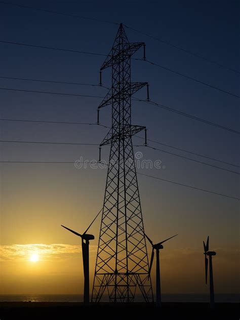 High Tension Tower And Wind Turbines Stock Photo Image Of