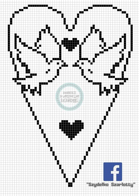 A Cross Stitch Pattern With Two Hearts In The Middle