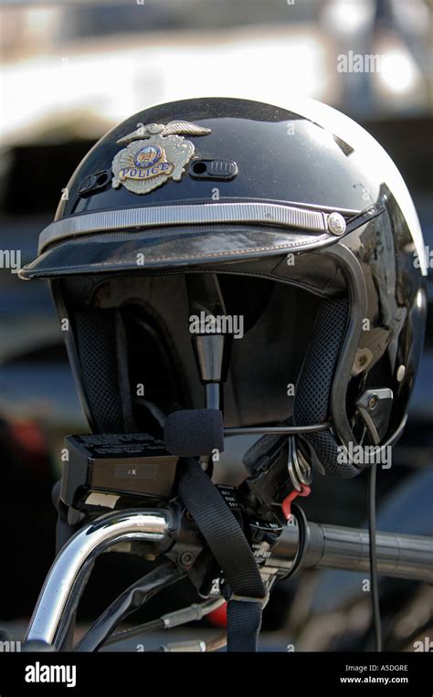 Closeup of motorcycle police helmet on bike's handlebar Stock Photo - Alamy