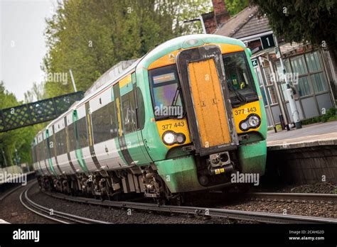 Class 377 passenger train in Southern Trains livery at a railway ...